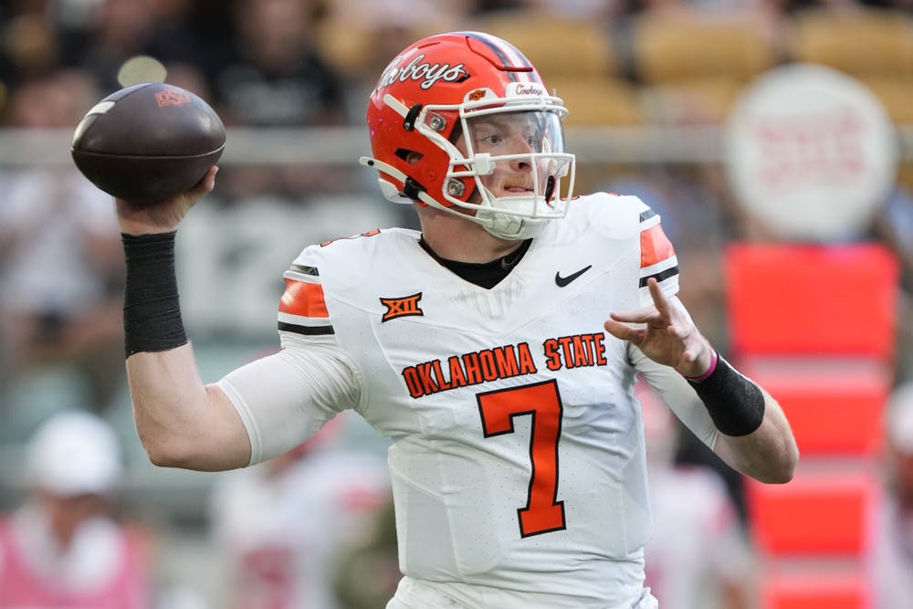 Cowboys quarterback Alan Bowman (7) makes a pass attempt in the first half during the game between the Oklahoma State Cowboys and the UCF Knights on Saturday, November 11, 2023 at FBC Mortgage Stadium, Orlando, Fla.