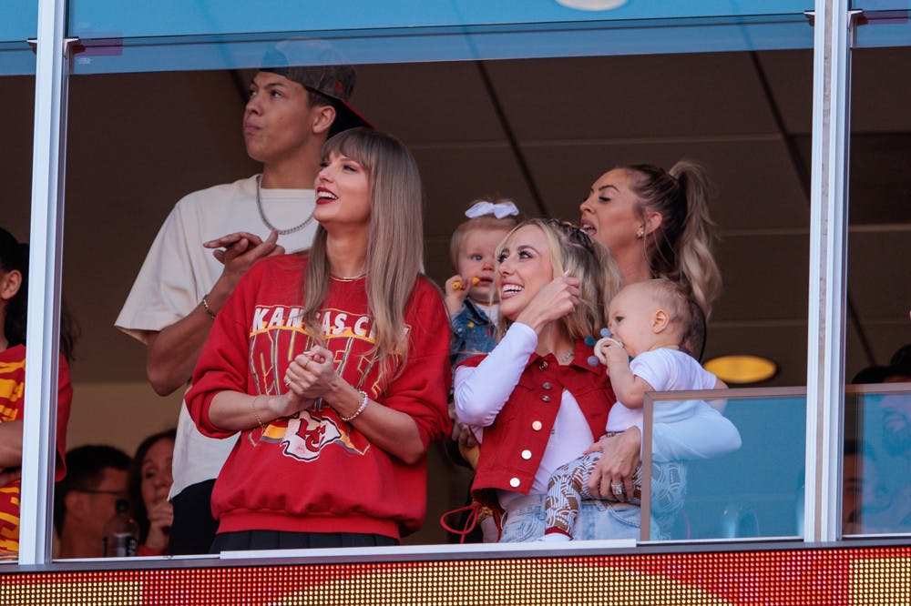 Grammy award winning artist Taylor Swift watches the game between the Kansas City Chiefs and the Los Angeles Chargers with Brittany Mahomes on October 22, 2023 at GEHA Field at Arrowhead Stadium in Kansas City, Missouri.