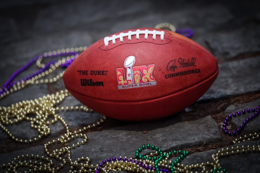 An official Super Bowl LIX football sits on some cobblestone surrounded by Mardi Gras beads ahead of Super Bowl LIX between the Kansas City Chiefs and the Philadelphia Eagles on February 7, 2025, in New Orleans, LA.