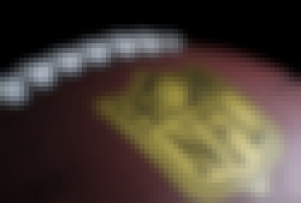 Close up of an NFL football with the NFL logo.