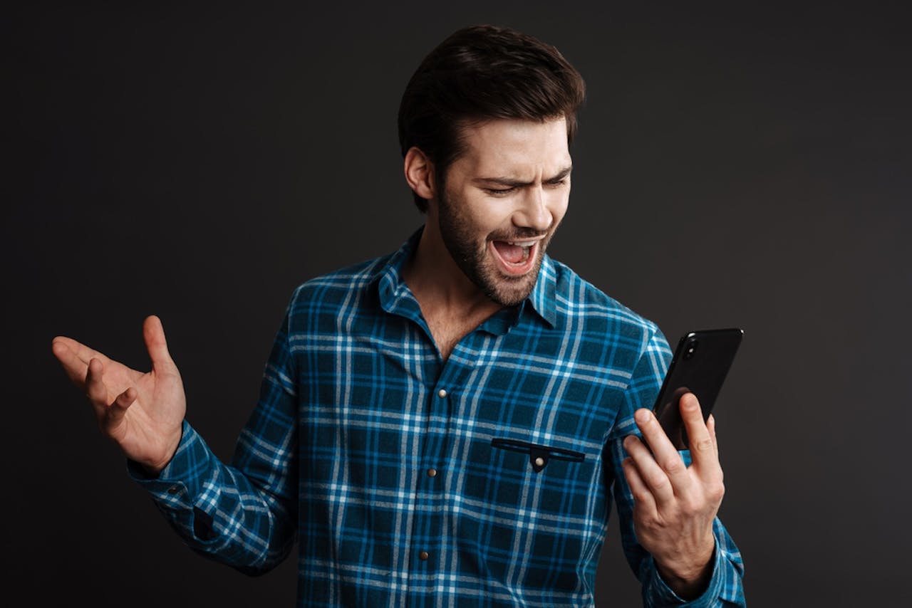 Man excited about sports betting. 
