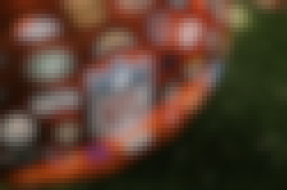 NFL football with many of the teams logos on it.